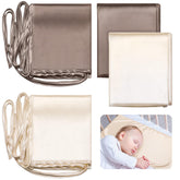 Hosuly satin bassinet sheet in coffee color draped on a bassinet for silky-smooth comfort