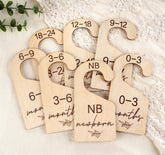 Houism wooden double-sided baby closet dividers organize newborn outfits.