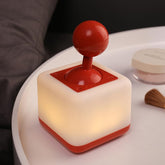 HPYDIY Rocker Night Light Red front view with a soft bedside glow for late-night tasks.