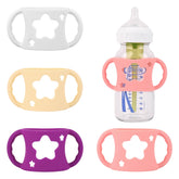 HUAKENER baby bottle handles in white with ergonomic grip for easy self-feeding practice.