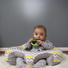 Hugaboo Original Infant Sitting Chair Yellow Chevron in use highlighting adjustable front strap and easy entry