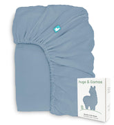 Hugs & Llamas organic muslin crib sheet close-up of soft fibers for baby skin.