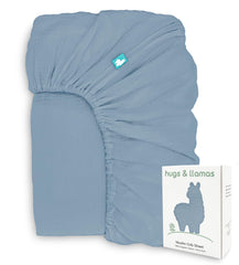 Hugs & Llamas organic muslin crib sheet close-up of soft fibers for baby skin.