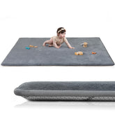 Huloo Sleep baby play mat closeup shows Elasti-Foam cushioning for comfy tummy time
