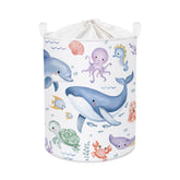HUUMONSS Sea Animals baby laundry hamper overview with blue whale design for tidy nursery organization