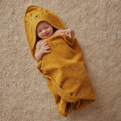 Absorbent terry detail on Huxie towel supports quick drying after baths.
