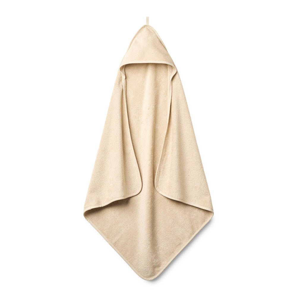 Huxie hooded towel fog closeup — soft organic cotton for gentle baby skin care