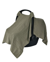 Huxie car seat cover in organic muslin sage green protects privacy and sun
