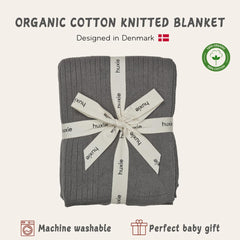 Huxie cloud grey fabric close-up shows breathable organic cotton warmth.