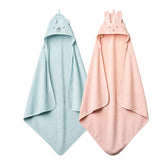 Huxie hooded towel Rabbit Blush wraps newborn in soft, gentle warmth.