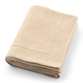 Huxie knitted baby blanket Fog close-up reveals soft organic cotton texture.