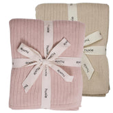 Huxie knitted baby blanket fog close-up shows ultra-soft organic cotton for sensitive skin.