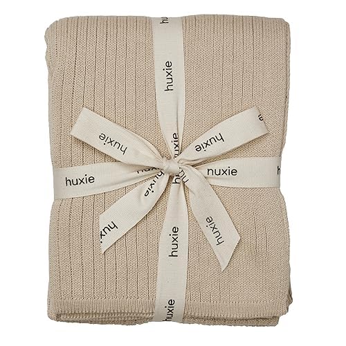 Huxie knitted baby blanket fog ribbed closeup shows ultra-soft texture for sensitive skin.