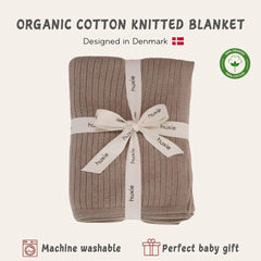 Huxie Mochachino knitted baby blanket in stroller showing all-season practicality