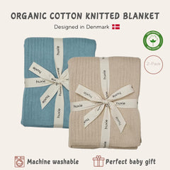 Huxie knitted baby blanket plush close-up demonstrates plush texture and organic fibers.