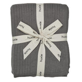 Huxie knitted baby blanket ribbed texture offers ultra-soft fabric for sensitive skin.