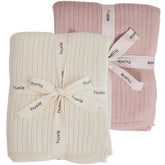 Huxie knitted baby blanket soft white close-up shows ultra-soft organic cotton for sensitive skin.
