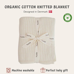 Huxie Knitted Baby Blanket soft white used on stroller for all-season warmth