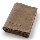 Huxie knitted organic cotton baby blanket soft closeup reveals gentle skin-friendly texture for newborns