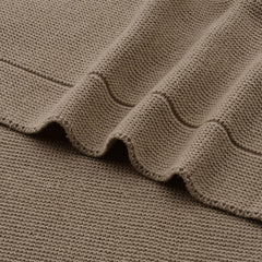 Huxie knitted organic cotton baby blanket in stroller-use scenario for outings
