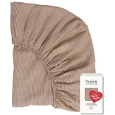 Huxie mini crib sheet Natural Stripe close-up shows ultra-soft organic cotton for baby comfort.