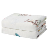 IBESTOPIA cow-print swaddle blanket with soft breathable fabric for cozy naps.