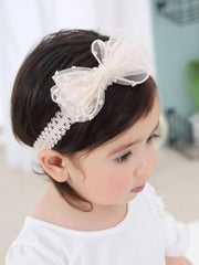 ickeyou baby bow headband closeup showing soft cotton for gentle skin.