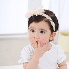 ickeyou baby bow headband lace detail highlights delicate design.