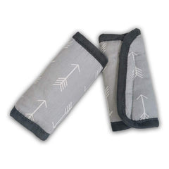 ICOPUCA car-seat strap pad in soft cotton cushions the strap for gentle comfort