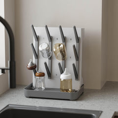 IEEK drying rack holds 12 bottles for organized post wash day