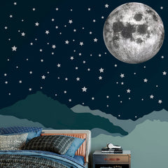 iinuu big moon wall decal creates a dreamy nursery focal point.