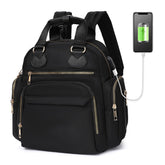 ILCOLPO small diaper bag backpack black front view for everyday baby outings