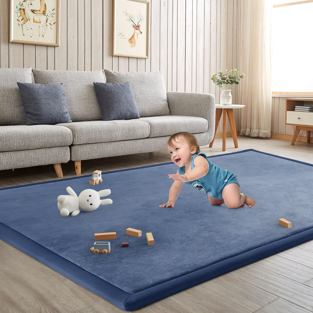 ILPEOD baby play mat blue closeup shows memory foam cushioning for safe tummy time.