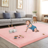 ILPEOD baby play mat pink on floor with soft cushioned surface for comfortable play