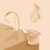 Incenseat transparent corner protectors installed on a table edge cushion playtime bumps