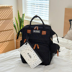 Inclusive LittleOnes changing station in use provides a clean, convenient diaper-change surface.