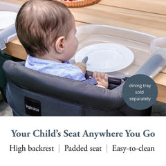 Inglesina Fast Table Chair attached to a table for safe feeding at meals.