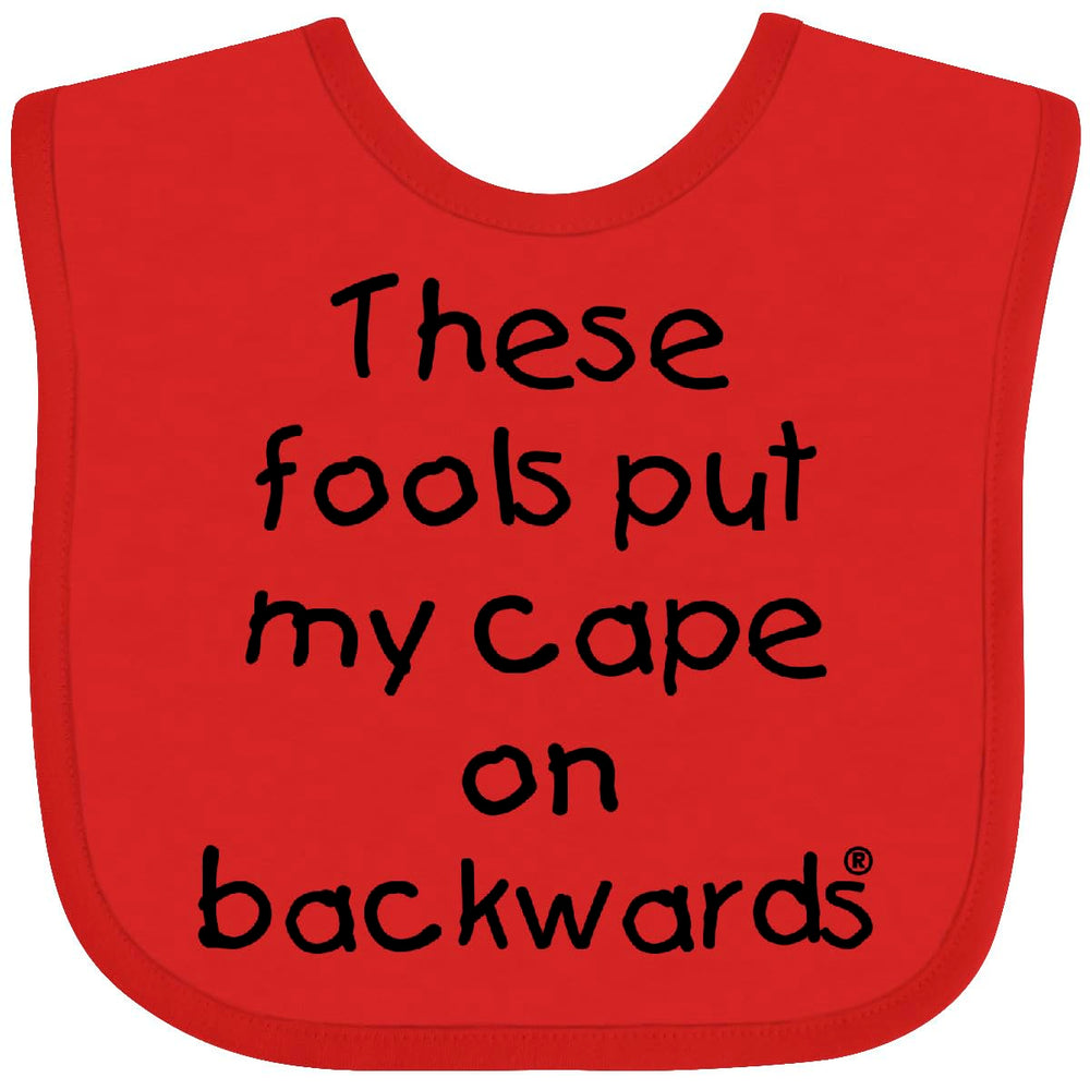 Inktastic These Fools Put My Cape on Backwards baby bib red, soft cotton for comfy mealtime