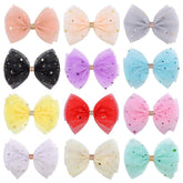 inSowni tulle bow with glitter star clip adds whimsy to everyday hairstyles.