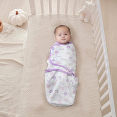 Insular swaddle owl design closeup highlights soft cotton fabric and secure Velcro for easy adjustments.
