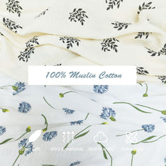 Insular boho muslin blanket blue dandelion tassels four sides against nursery backdrop adds warmth.