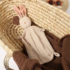 insular Bunny Lovey blanket child holding shows portable comfort for on-the-go moments