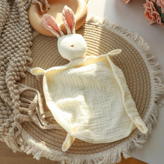 Insular Bunny Lovey Blanket closeup showing four-layer organic muslin for breathable softness.