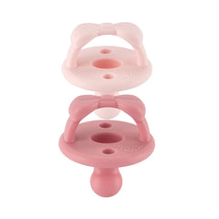 Itzy Ritzy pacifier with two air holes enhances breathability for baby comfort.