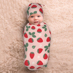 Jarverce Strawberry Swaddle Blanket closeup fabric reveals soft texture and elastic weave