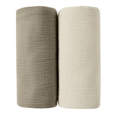 JELLYMONI Muslin Swaddle Blanket texture close-up highlights soft, breathable fabric for delicate newborn skin.