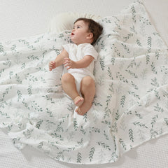 JELLYMONI swaddle blanket close-up shows soft, breathable muslin for gentle baby skin.