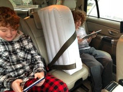 Jet Creations backseat divider keeps kids separated for a peaceful journey.