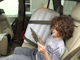 Jet Creations inflatable backseat divider installed for a calmer ride.