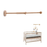 JETM·HH wooden crib mobile arm close-up in natural beechwood elevates nursery decor.